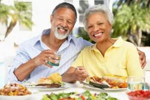 couple smiling after getting dentures from Center for Cosmetic Dentistry